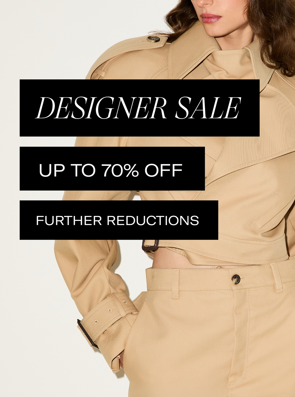 A cropped studio photo of a woman wearing a beige trench coat and matching trousers against a light neutral background, with three black text blocks reading 'DESIGNER SALE', 'UP TO 70% OFF', and 'FURTHER REDUCTIONS'.