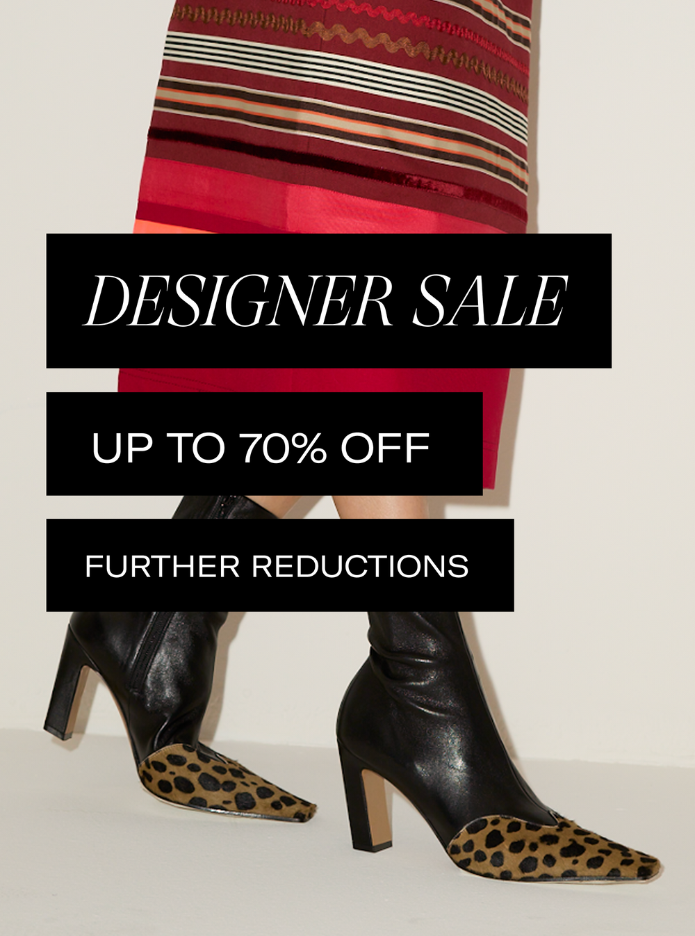 A promotional graphic showing a person from the waist down wearing black pointed-toe heeled boots with leopard-print fabric on the toes, paired with a red and beige striped skirt. Three black text boxes overlay the center with the text 'DESIGNER SALE', 'UP TO 70% OFF', and 'FURTHER REDUCTIONS'.